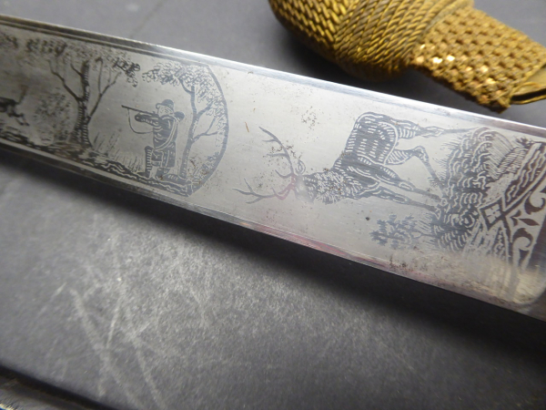 Heavy stag hunter with triple blade etching and Saxon portepee