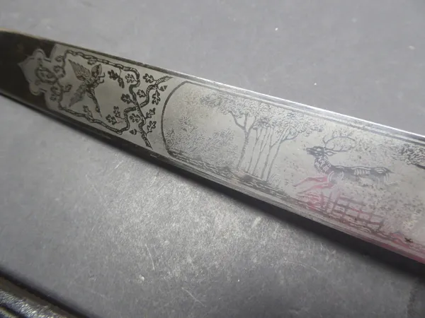 Heavy stag hunter with triple blade etching and Saxon portepee