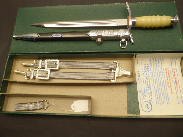 GDR NVA army service dagger with engraved scabbard + hanger + guarantee certificate from 1991 in box, matching numbers