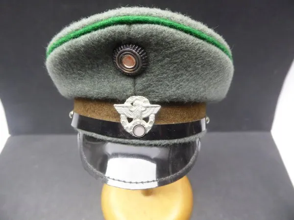 Miniature cap probably for the regular police