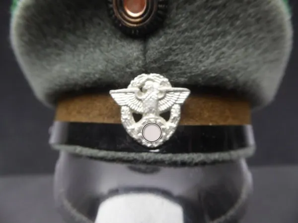 Miniature cap probably for the regular police