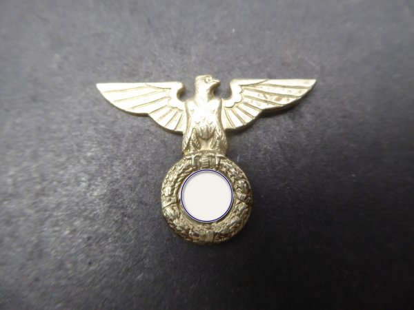 Early cap eagle, split pins missing