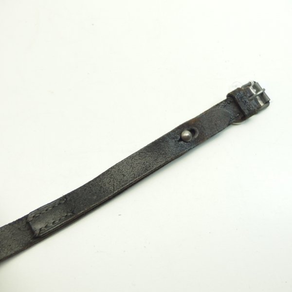 Straps for cookware with manufacturer