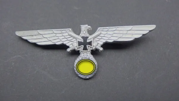 Cap eagle NSKOV NS Kriegerbund Kyffhäuser. Non-ferrous metal on needle. With manufacturer.