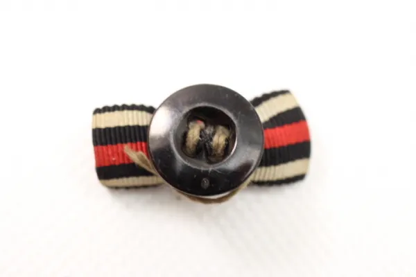 Ww1 buttonhole clip in three parts