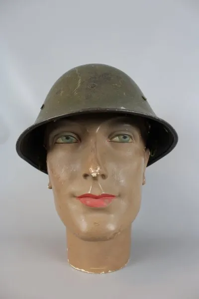 Steel helmet abroad, 6 rivets all around, no interior, original paint