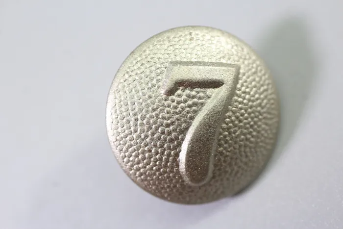 Original metal uniform button, also known as a livery button