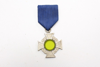 Cross medal Treuedienstabzeichen in silver on a ribbon for 25 years of loyal service, uncleaned