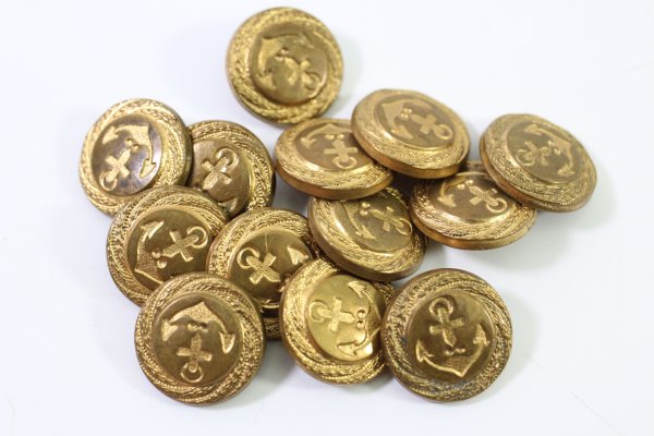 Metal buttons from a German uniform tailor, head uniform