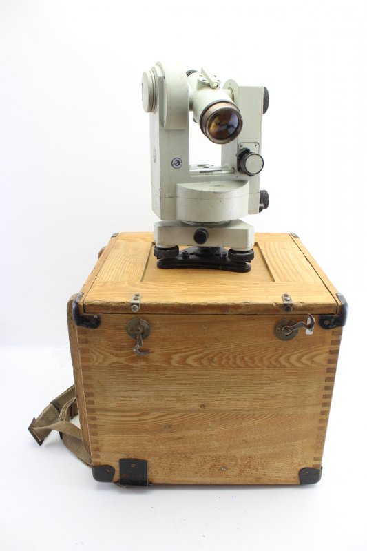 Well-preserved surveying theodolite in a wooden box, this one with carrying strap