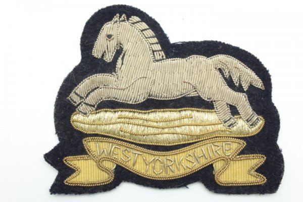 Uniform badge English, worn condition