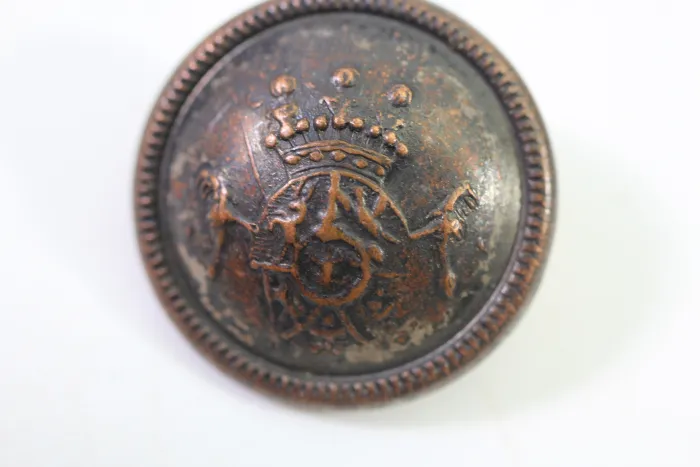 5 metal buttons with crests, from an old uniform tailor's shop