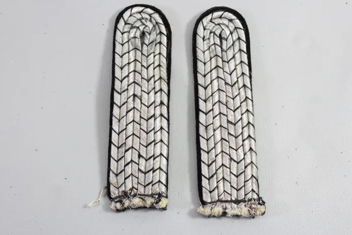 Paired shoulder boards for a RAD field master on black cloth