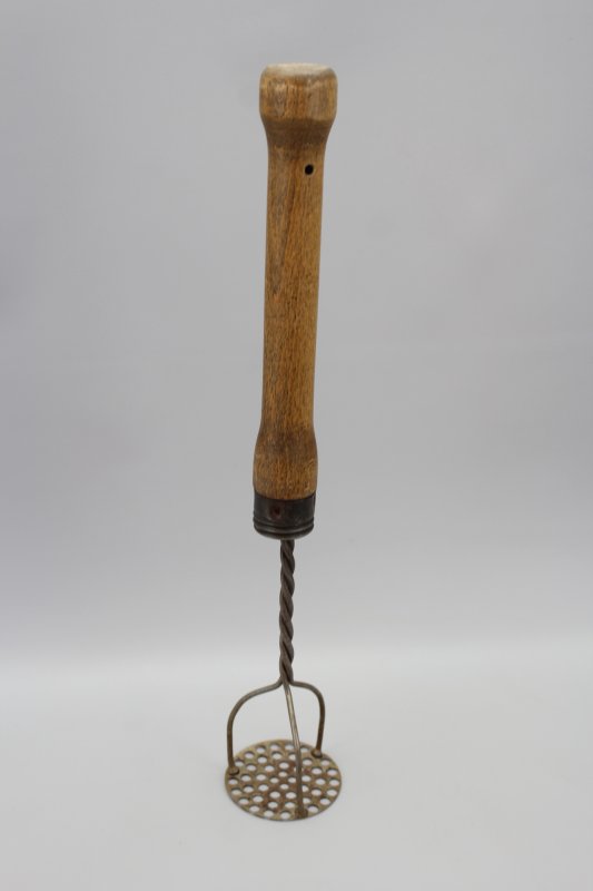 Potato masher on the stick of a Wehrmacht hand grenade model 1943