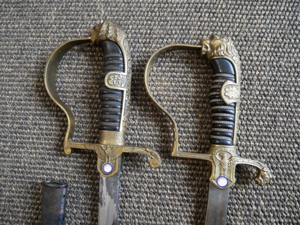 Two lion-head officer's sabers, WWII.