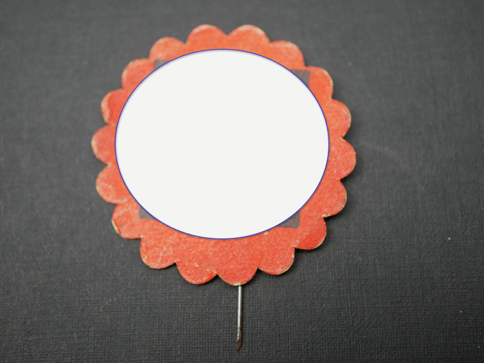 Paper badge – flower with swastika – Labor Day