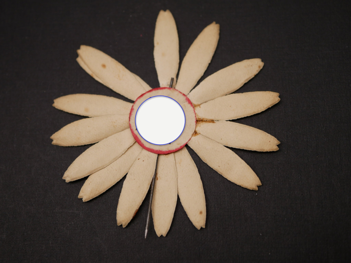 Paper badge – flower with swastika – Labor Day