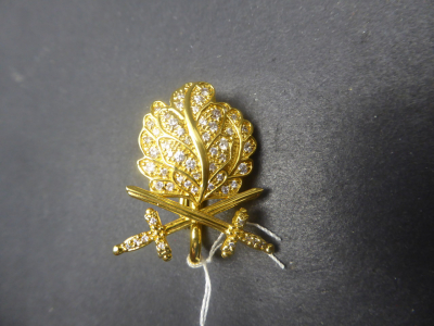 Gilded oak leaves with swords and diamonds for the Knight's Cross of the Iron Cross.