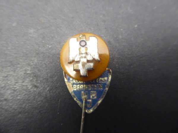 Badge - DRK German Red Cross with amber and label
