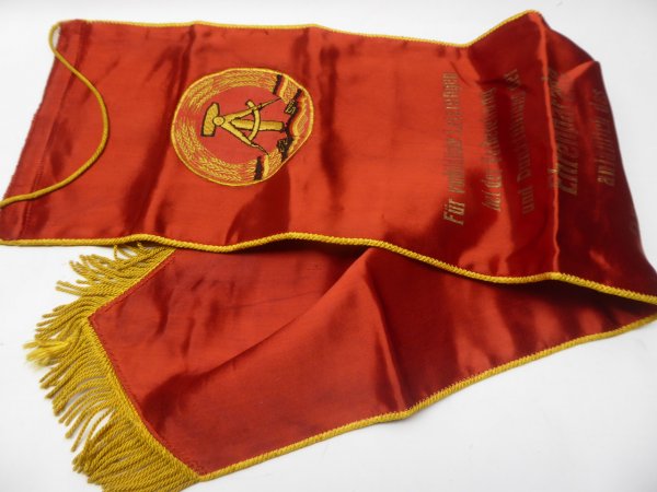 GDR NVA flag loop / pennant - "For exemplary performance and implementation of the parade of honor" 25 years GDR, Berlin